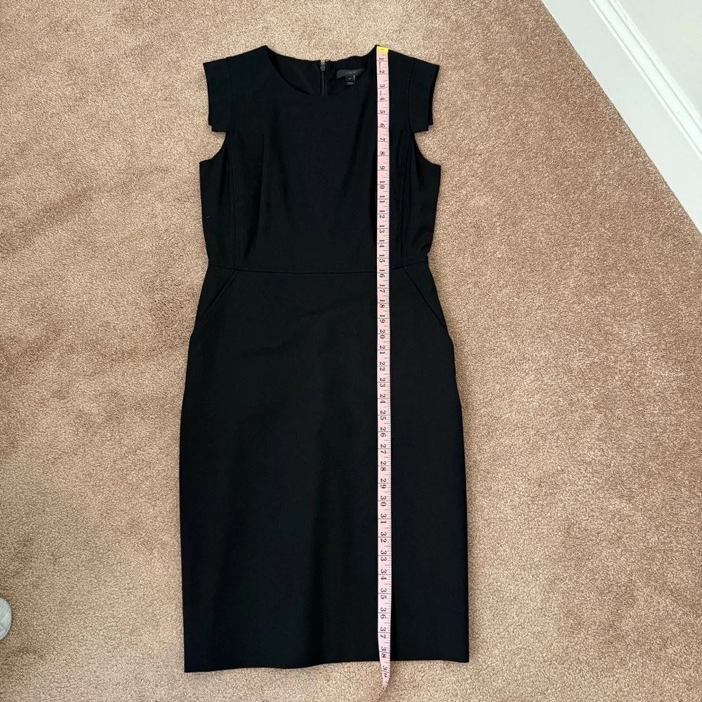 J. Crew Elegant Black Resume Dress. Pockets, back vent and zipper. Sleeveless.